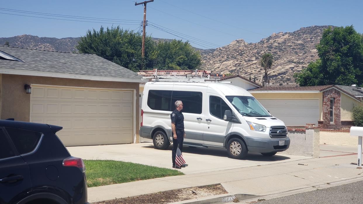 A Simi Valley police officer stands outside the Simi Valley home of Nicholas John Roske Wednesday, June 8, 2022. Roske was charged with attempted murder of Supreme Court Justice Brett Kavanaugh.