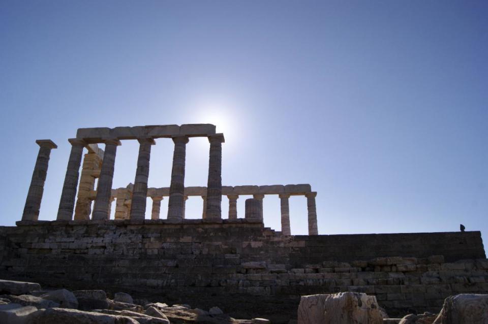 In this Dec. 12, 2016 photo, the Temple of Poseidon, an ancient hilltop structure on the southern peninsula of Sounion dedicated to the god of the sea is shown. For travelers with more than beaches on their minds, there's plenty of upside to a brief winter visit to Athens that avoids the crowds and heat of summer. (Jerrin Heller via AP)