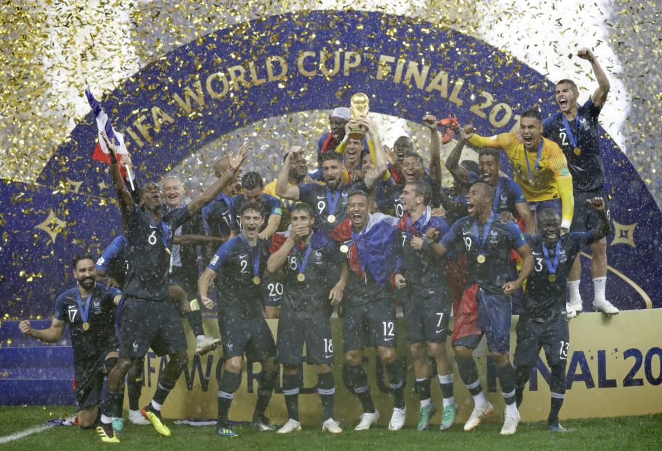 FILE - France goalkeeper Hugo Lloris holds the trophy aloft as he celebrates with his teammates after the final match between France and Croatia at the 2018 soccer World Cup in the Luzhniki Stadium in Moscow, Russia, Sunday, July 15, 2018. France won the final 4-2. (AP Photo/Matthias Schrader, File)