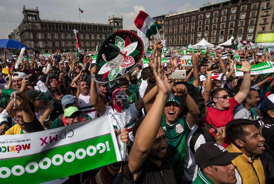 Fans celebrate Mexico's goal against Korea during their Russia World Cup soccer match (AP)