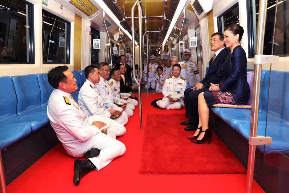 Image: King Maha Vajiralongkorn and Queen Suthida (Royal Household Bureau / Reuters)