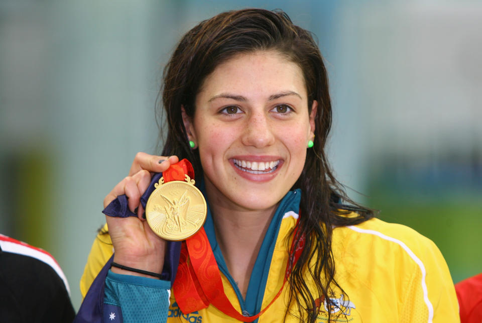 Stephanie Rice of Australia poses with the gold medal during the medal ceremony for the Women's 200m Individual Medley held at the National Aquatics Center on Day 5 of the Beijing 2008 Olympic Games on August 13, 2008 in Beijing, China. (Photo by Adam Pretty/Getty Images)