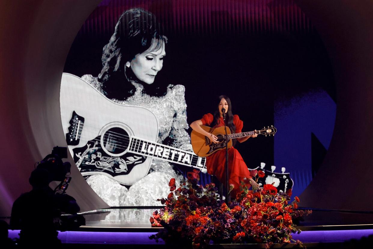 An image of the late Loretta Lynn is projected on a screen while Kacey Musgraves performs onstage during the 65th GRAMMY Awards at Crypto.com Arena on February 05, 2023 in Los Angeles, California.