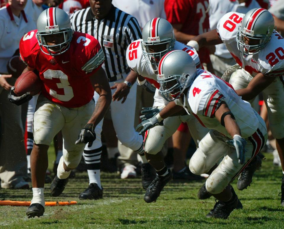 Bam Childress eludes tacklers during the Ohio State spring game on April 26, 2003.