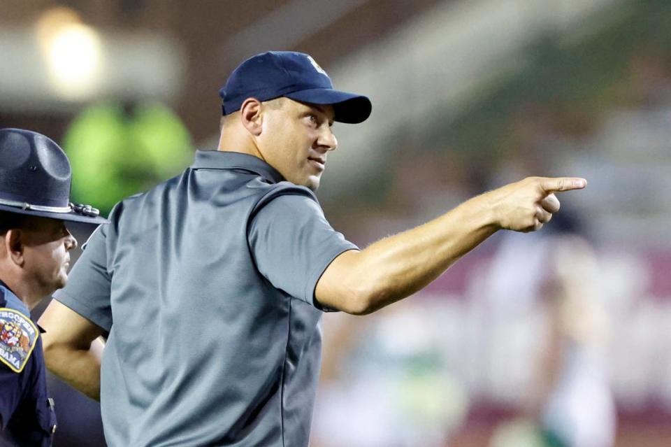 FILE - Troy head coach Jon Sumrall reacts after his team defeated Marshall in an NCAA college football game, Saturday, Sept. 24, 2022, in Troy, Ala. The Trojans were 1-2 and reeling from a demoralizing loss on an Appalachian State Hail Mary. They haven’t lost since. (AP Photo/Butch Dill, File)