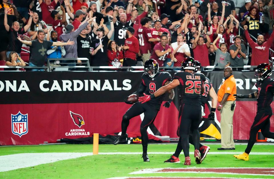 Arizona Cardinals linebacker Isaiah Simmons (9) celebrates his pick-six against the New Orleans Saints.