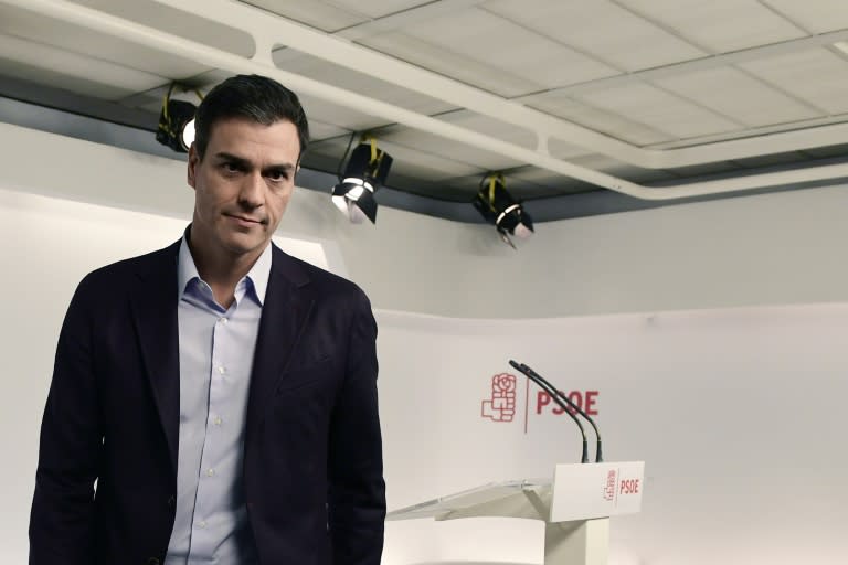 Spanish Socialist Party (PSOE) leader Pedro Sanchez leaves after a press conference at the PSOE headquarters in Madrid following his resignation as party head during an extraordinary meeting of the PSOE Federal Committee on October 1, 2016