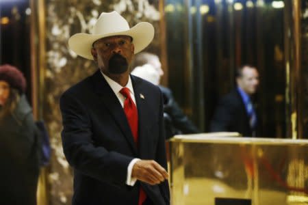 Milwaukee County Sheriff David Clarke Jr. departs after a meeting with U.S. President elect Donald Trump at Trump Tower New York, U.S., November 28, 2016.  REUTERS/Lucas Jackson