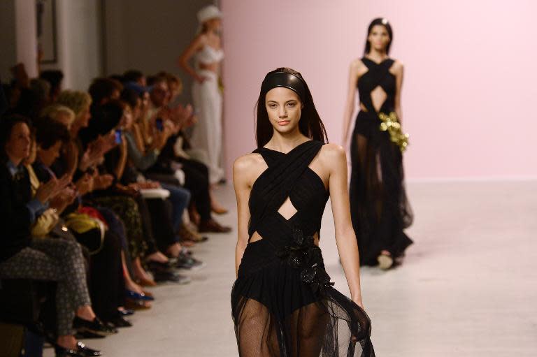 Models present creations by Pascal Millet during the 2015 Spring/Summer ready-to-wear collection fashion show, on September 23, 2014 in Paris