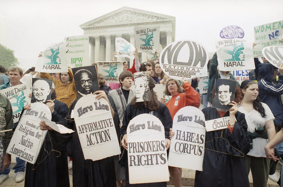 <span class="s1">Demonstrators gathered outside the Supreme Court in April 1992 as the court heard arguments over a restrictive Pennsylvania abortion statute. (Photo: Greg Gibson/AP)</span>