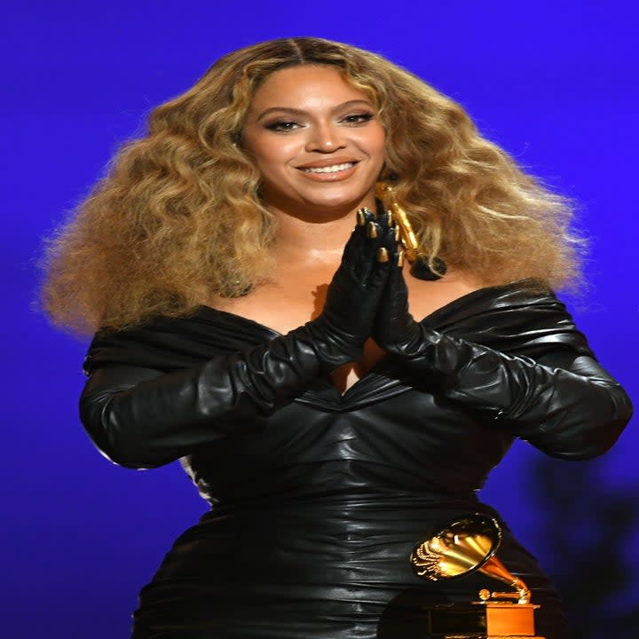 Beyoncé smiling with an award