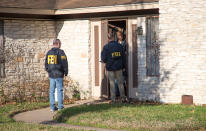 <p>Authorities are investigating the scene in East Austin, Texas, after a teenager was killed and a woman was injured in the second Austin package explosion in the past two weeks Monday, March 12, 2018. (Photo: Ricardo B. Brazziell/Austin American-Statesman via AP) </p>