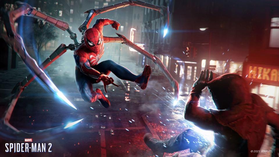 Spider-Man in Insomniac Game's "Spider-Man 2" fighting a criminal.