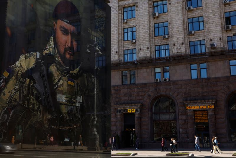 Banner advertising contract military service in the Ukrainian Armed Forces is seen in central Kyiv