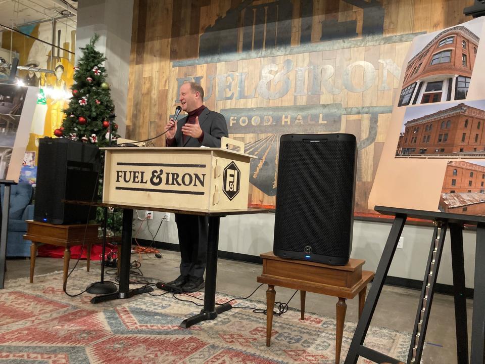 Colorado Governor Jared Polis speaking at Fuel and Iron Food Hall in downtown Pueblo on December 12, 2023.