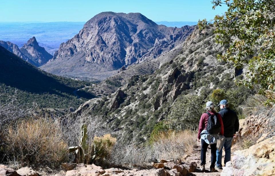 Hikers take in the view along the Chisos Basin of Big Bend National Park on Jan. 25.