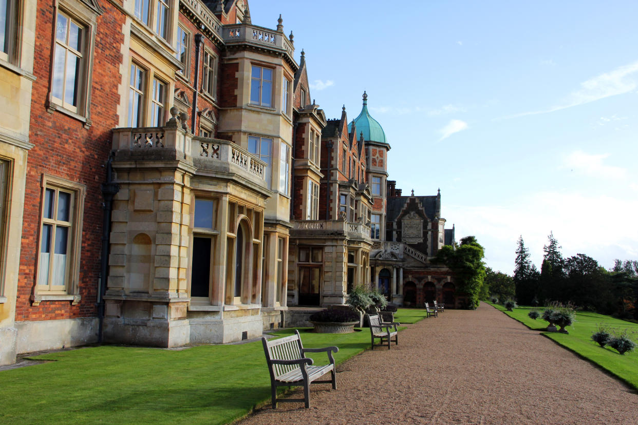 Sandringham, England - October 17, 2012: The front of Sandringham House in Norfolk, facing the park. Situated on 60 acres of parks and gardens, it has been a country retreat since 1870.