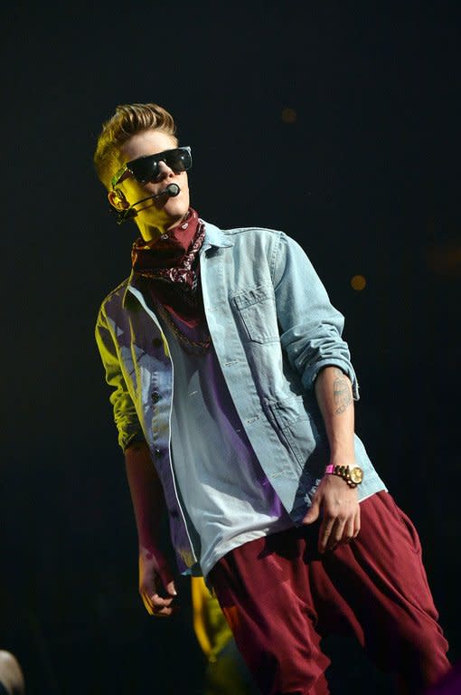 Justin Bieber performs onstage during Power 96.1's Jingle Ball 2012 at the Philips Arena on December 12, 2012 in Atlanta. Psy's "Gangnam Style" became the first video to hit a billion views on YouTube on Friday, marking a fresh milestone in the global craze for the South Korean rapper and his horse-riding dance