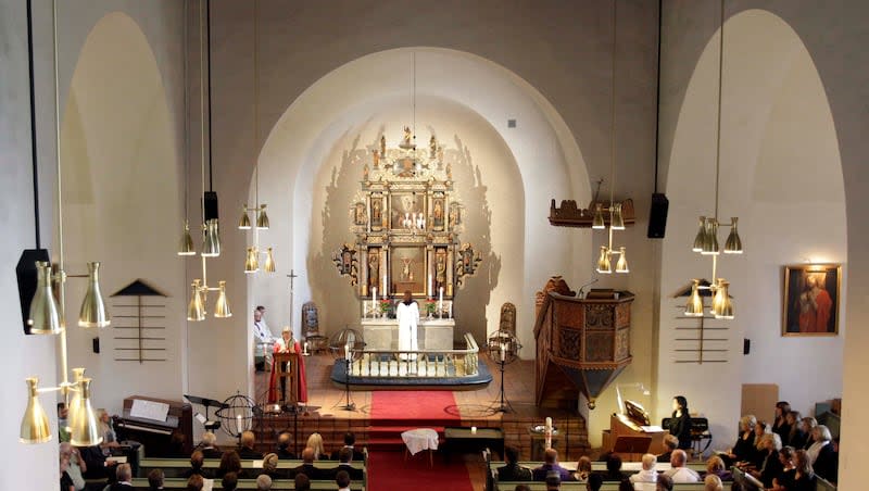 A memorial service is held in a church in Norderhov, Norway, Sunday, July 24, 2011.