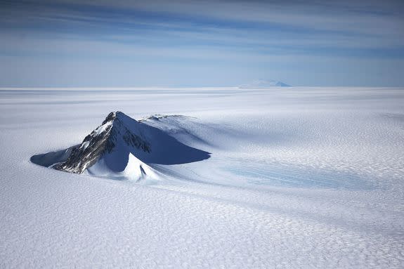 A section of the West Antarctic Ice Sheet with mountains, as seen from a NASA Operation IceBridge plane, Oct. 28, 2016.
