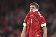 Russia's Igor Diveyev is dejected after the Euro 2020 soccer championship group B match between Russia and Denmark at the Parken stadium in Copenhagen, Denmark, Monday, June 21, 2021. Denmark won 4-1. (Stuart Franklin/Pool via AP)