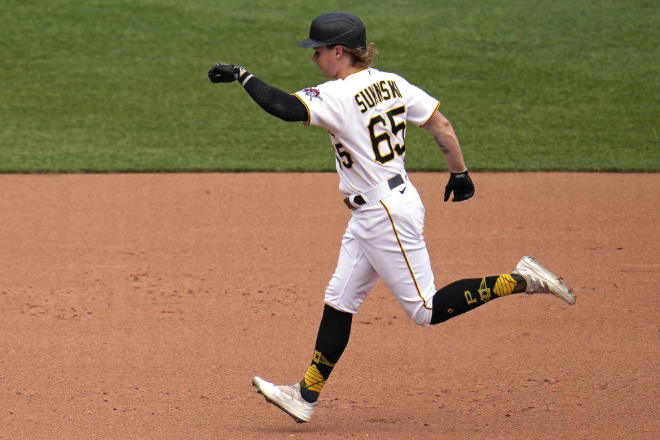 Pittsburgh Pirates' Jack Suwinski rounds the bases after hitting a solo home run off New York Mets starting pitcher Carlos Carrasco during the fourth inning of a baseball game in Pittsburgh, Sunday, June 11, 2023. (AP Photo/Gene J. Puskar)