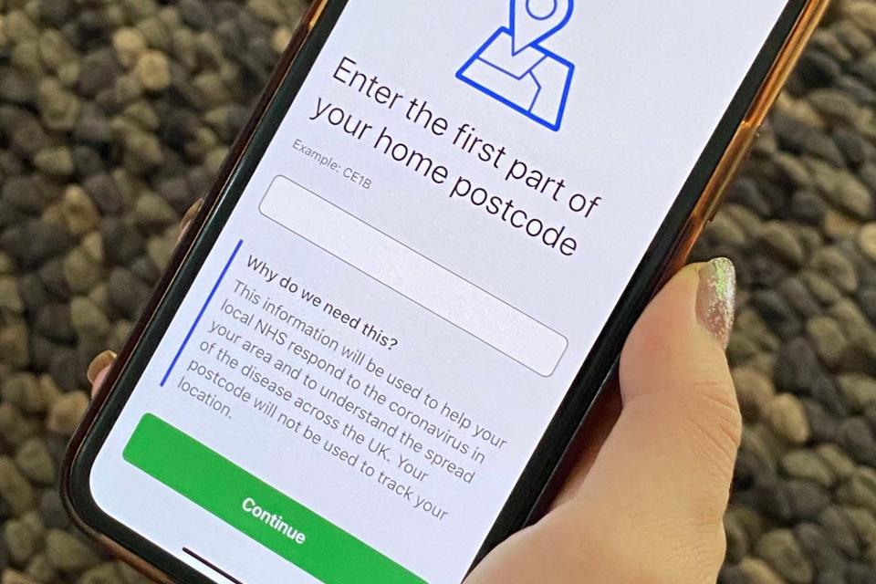 The NHS contact tracing app on a mobile phone: PA