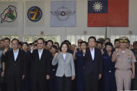 Taiwan President Tsai Ing-wen, center, poses for photos at the Penghu Magong military air base in outlying Penghu Island, Taiwan Tuesday, Sept. 22, 2020. Tsai visited the military base on one of Taiwan’s outlying islands Tuesday in a display of resolve following a recent show of force by rival China. (AP Photo/Wu Huizhong)