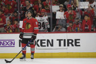 Chicago Blackhawks' Frank Nazar looks on during warmups before a NHL hockey game against the Carolina Hurricanes, Sunday, April 14, 2024, in Chicago. (AP Photo/Paul Beaty)