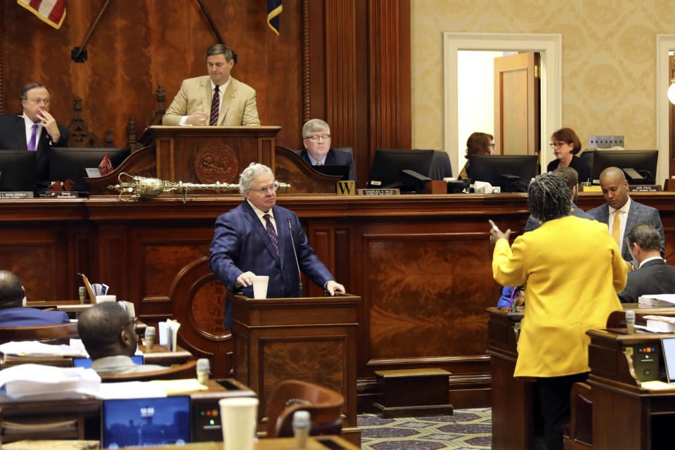 South Carolina Rep. Gilda Cobb-Hunter, D-Orangeburg, right, asks a question of Rep. Jay West, R-Belton, center, during a debate over an energy bill, Wednesday, March 27, 2024, in Columbia, S.C. (AP Photo/Jeffrey Collins)