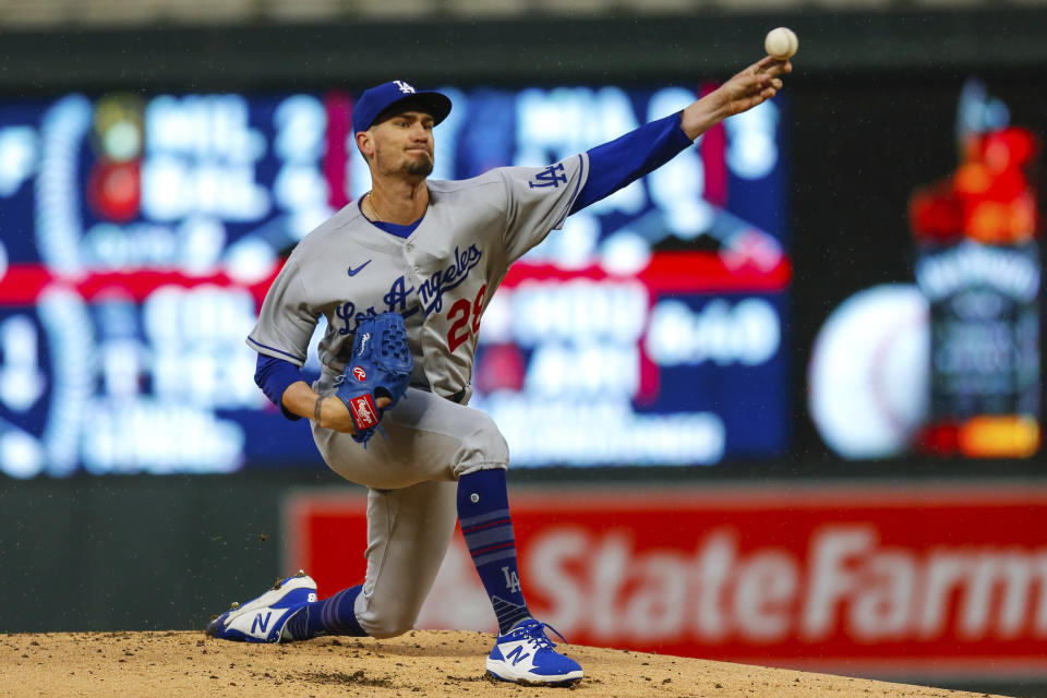 Los Angeles Dodgers starting pitcher Andrew Heaney throws to a Minnesota Twins batter during the first inning of a baseball game Tuesday, April 12, 2022, in Minneapolis. (AP Photo/Nicole Neri)