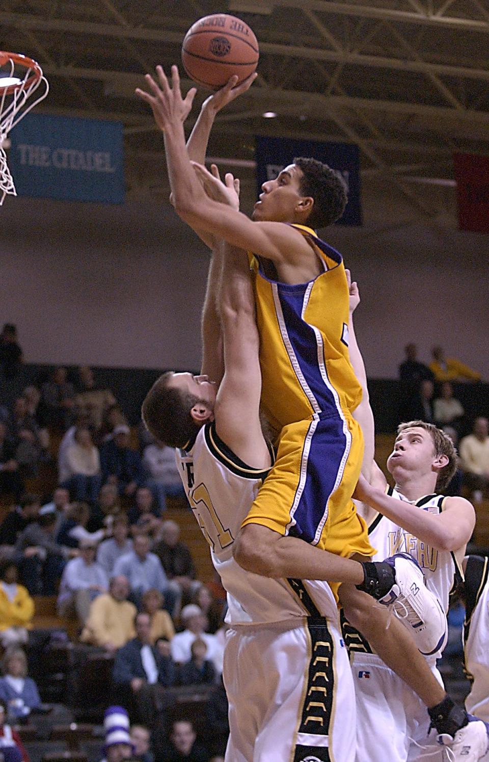 Western Carolina's Kevin Martin, a Zanesville native, goes up in the lane during a March 2004 game against Wofford. Martin will be inducted into the Catamounts' Athletic Hall of Fame in November.