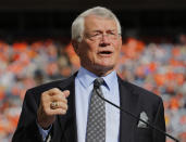 FILE - In this Sept. 14, 2014, file photo, former Denver Broncos head coach Dan Reeves is inducted into the Denver Broncos Ring of Fame during an NFL football game between the Broncos and the Kansas City Chiefs in Denver. Reeves, who won a Super Bowl as a player with the Dallas Cowboys but was best known for a long coaching career highlighted by four more appearances in the title game with the Denver Broncos and Atlanta Falcons, died Saturday, Jan. 1, 2022. (AP Photo/Jack Dempsey, File)