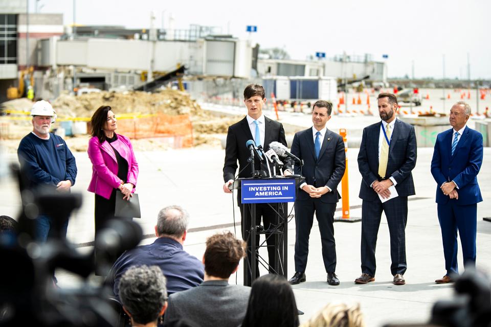 Iowa Auditor Rob Sand speaks during a news conference for a $20 million construction project grant from the Bipartisan Infrastructure Law with Transportation Secretary Pete Buttigieg, center right, Thursday, May 25, 2023, at the Eastern Iowa Airport (CID) in Cedar Rapids, Iowa.