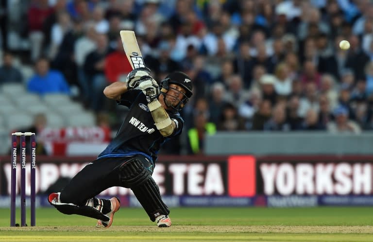 New Zealand's Luke Ronchi hits the ball to be caught out by England's Jonny Bairstow during the Twenty20 international match at Old Trafford on June 23, 2015