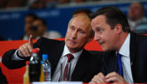 LONDON, ENGLAND - AUGUST 02: Russian President Vladimir Putin (L) watches Judo with British Prime Minister David Cameron on Day 6 of the London 2012 Olympic Games at ExCeL on August 2, 2012 in London, England. (Photo by Laurence Griffiths/Getty Images)