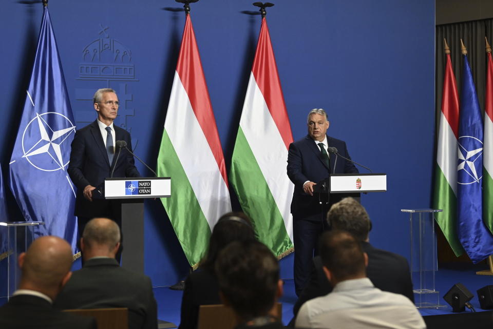 Hungarian Prime Minister Viktor Orban, right, and NATO Secretary General Jens Stoltenberg hold a press conference following their meeting in the government headquarters in Budapest, Hungary, Wednesday, June 12, 2024. (Zoltan Mathe/MTI via AP)