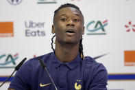France's Eduardo Camavinga listens to a reporter during a press conference at the Jassim Bin Hamad stadium in Doha, Qatar, Saturday, Nov. 19, 2022, ahead of the upcoming World Cup. France will play their first match in the World Cup against Australia on Nov. 22. (AP Photo/Christophe Ena)
