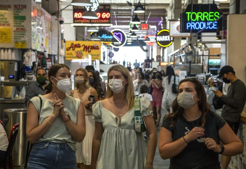 LOS ANGELES, CA - JULY 27, 2021- Visitors to the Grand Central Market are mostly masked on Tuesday, July 27, 2021 in Los Angeles, CA. (Brian van der Brug / Los Angeles Times)