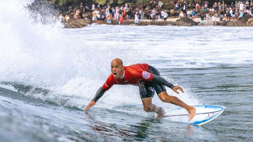 Kelly Slater surfs Snapper Rocks. 