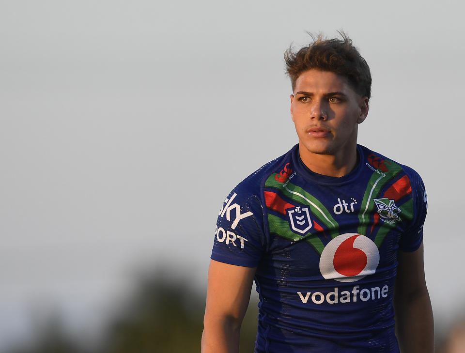 Reece Walsh (pictured) looks on before the start of the round 24 NRL match.