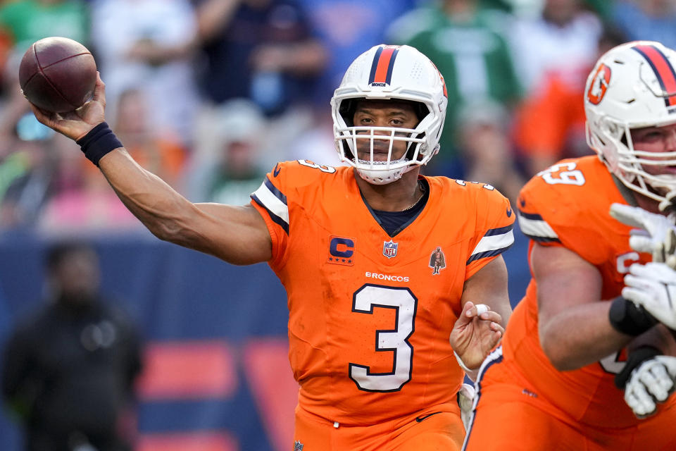 Denver Broncos quarterback Russell Wilson passes against the New York Jets during the second half of an NFL football game Sunday, Oct. 8, 2023, in Denver. (AP Photo/Jack Dempsey)