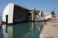 A capsized ship is seen at Beirut port