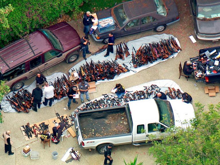 Police have seized more than 1,000 guns from a mansion in California, where photographs and video show guns stacked on top of one another in a line that extends the length of several cars.The guns were found on Wednesday in the upscale Holmby Hills neighbourhood, where law enforcement described a property resembling a “hoarder’s house” that kept 30 officers busy for 15 hours as all of the firearms were removed from the mansion.The search was initiated by Los Angeles Police officers and agents with the Bureau of Alcohol, Tobacco, Firearms, and Explosives (ATF), who served up a search warrant in the suspicion that someone was manufacturing or selling illegal firearms, according to the Los Angeles Police Department.Police arrested 57-year-old Girard Saenz at the house, which also had stockpiles of ammunition sitting around.Mr Saenz, who has been accused of violating California laws on owning assault weapons and machine gun rifles.State law prohibits the manufacture, distribution, transportation, importation, and sale of any assault rifle or .50 Browning Machine Gun rifles, except under certain rare circumstances.Mr Sanez was released after his arrest on $50,000 bail, and details of that release were not immediately made public.ATF spokesperson Ginger Colbrun told CNN in a written statement that law enforcement received an anonymous tip about the stockpile indicating that someone was “conducting illegal firearms transaction outside the scope of the federal firearm license”. There was also equipment to manufacture firearms at the home.The bust comes roughly four years after police seized 1,200 guns and seven tons of ammunition from a home, alongside $230,000 in cash after a man died of natural causes in his SUV. It was then the largest seizure from a single home.