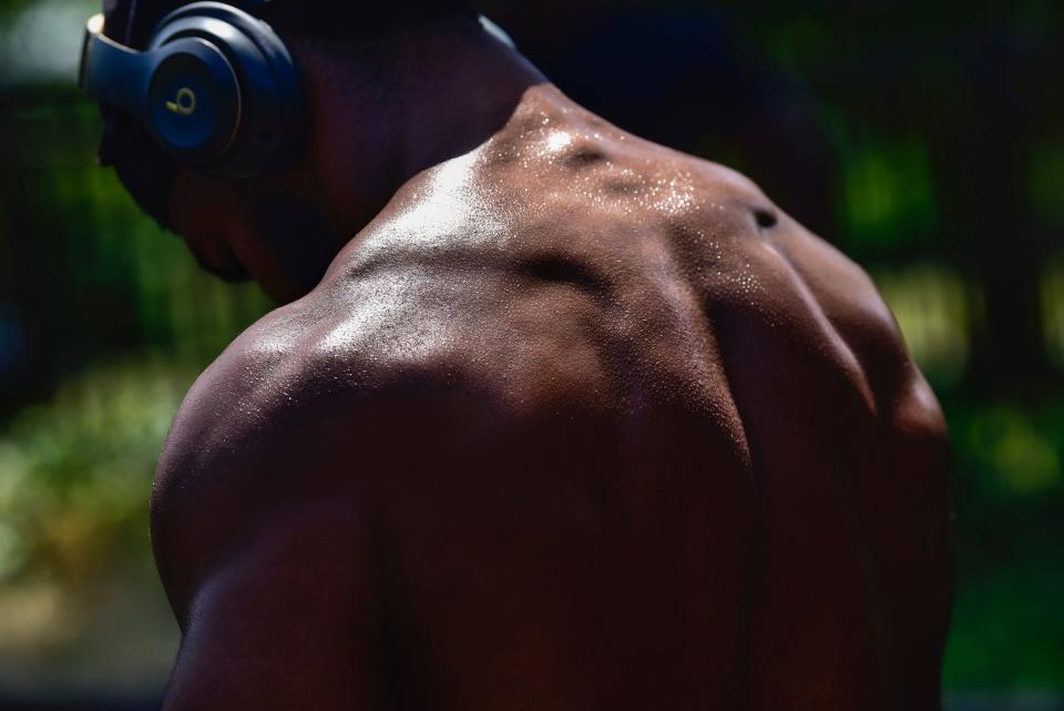 Kishaun Morgan of Paterson, sweats as he works out at Eastside Park in Paterson, Sunday on 07/24/22.