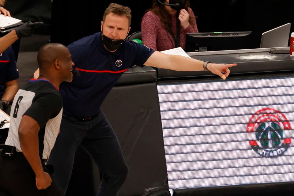 Washington Wizards head coach Scott Brooks argues a call with referee Tony Brown (6) during a game last month in Washington.