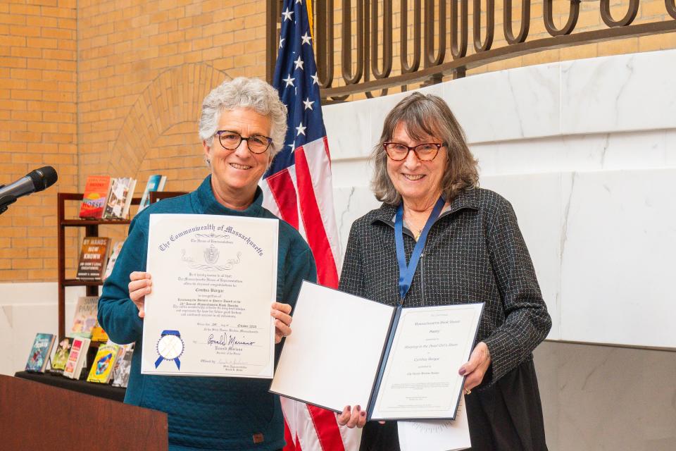 State Rep. Sarah Peake, D- Provincetown, (left) stands with poet Cynthia Bargar.