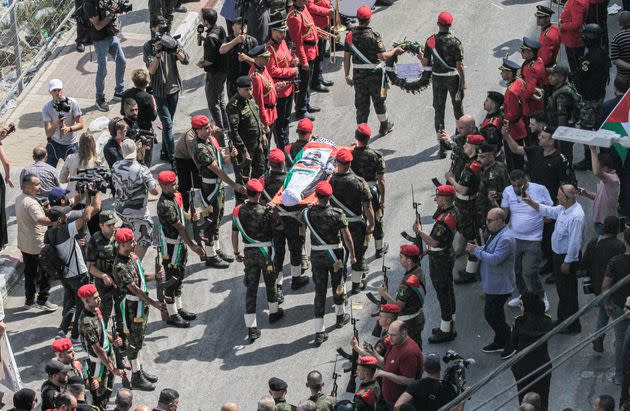 Palestinian security forces carry the body of slain International Solidarity Movement activist Ayşenur Eygi during a funeral procession in the occupied West Bank city of Nablus. The White House expressed outrage over the death of Eygi, a U.S. citizen, who was fatally shot by Israeli forces, but stopped short of imposing any consequence on the military.