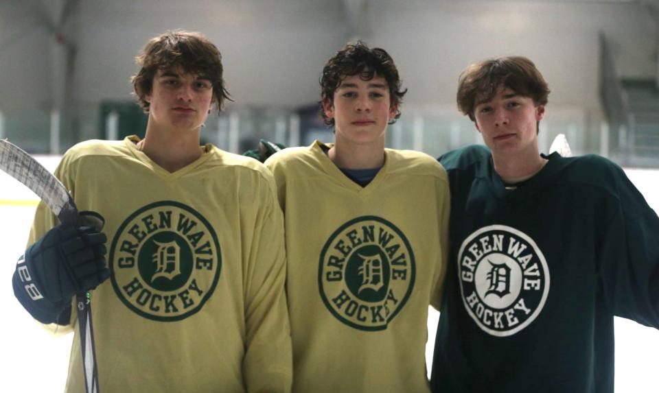 Dover High School hockey captains, from left, Caleb Marasca, Owen Culcasi and Carter Bell, are ready to try to lead the Green Wave to a second consecutive Division II state championship in 2023-24.