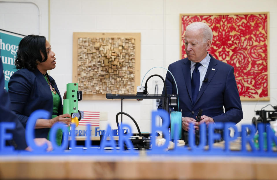 President Joe Biden listens during a tour of the Cuyahoga Community College Manufacturing Technology Center, Thursday, May 27, 2021, in Cleveland. (AP Photo/Evan Vucci)